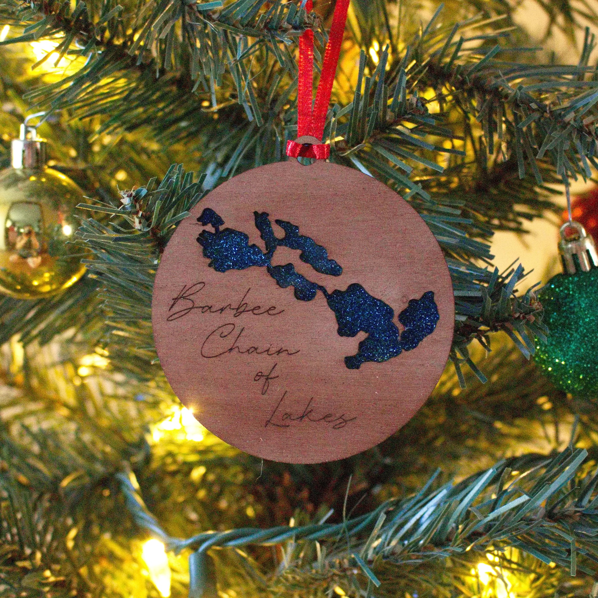 Barbee Chain of Lakes Christmas ornament for the family to remember time spent together on the lake. Made out of wood and acrylic with attention to detail. This is something you will love.