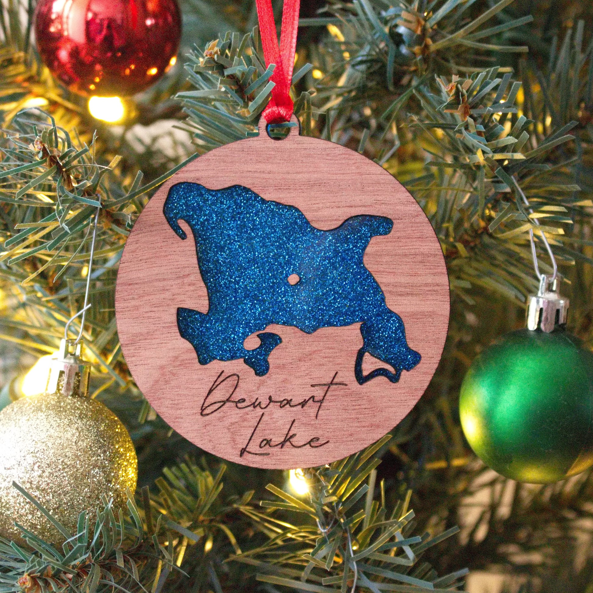Dewart Lake Christmas ornament for the family to remember time spent together on the lake. Made out of wood and acrylic with attention to detail. This is something you will love.